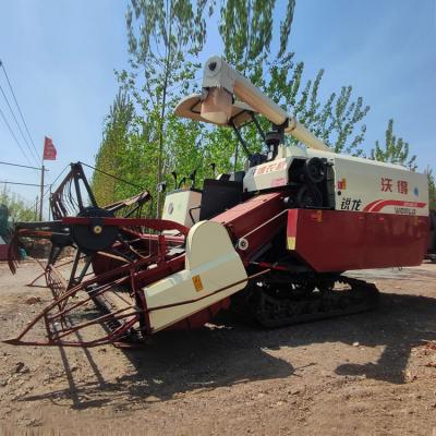 China Hot Selling Rice WORLD Edition With Cabin 4LZ-5.0E Self Propelled Full Crawler Feed Grain Combine Harvester For Farms for sale