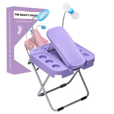 China Convenient for you to apply nails and pedicure at home. Pedicure foot rest with LED magnifier and drying fan, adjustable foot rest, reinforced and thickened for sale