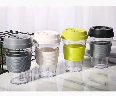 China Popular Anti Scald Plastic Coffee Cups With Silicone Sleeve BPA Free 9*14cm for sale