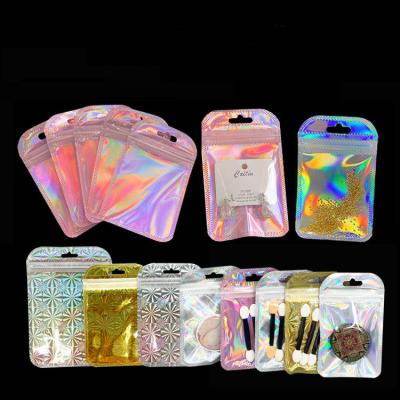 China Laser Smell Proof Foil Moisture Proof Silver Holographic Resealable Ziplock Bags Flat Clear Pouch Storage Bag Aluminum Plastic Packaging for sale