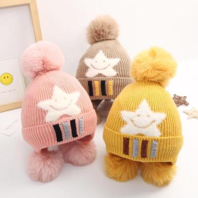 China Popular Children's Earflap Hat With Fleece Lining Winter Baby Keep Warm Fluffy Ball Beanie Cap for sale