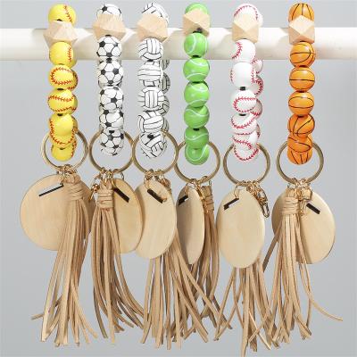 China Popular Wooden Wrist Tassels Wooden Tassels Bracelet Beads Sports Baseball Basketball Football Volleyball Holder Key Chain Bead Key Chain for sale