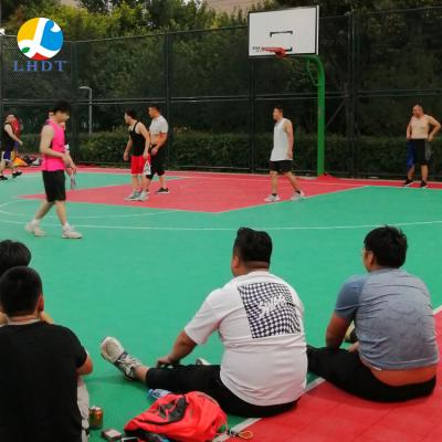 China Best Selling Piso Tenis De Mesa Interlocking Floor Tiles Volleyball Court Sports Basketball Waterproof Anti-Skid Outdoor Flooring for sale