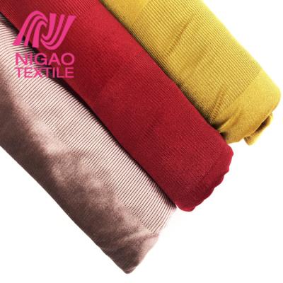 China Winter Fashion Jacquard Jacquard Fabric Multicolor High Fashion Stretch Velvet Running Fabric Thick Spandex Fabric For Clothes Pants for sale