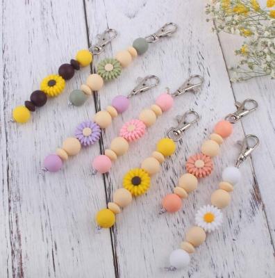 China Fashional Small Daisy Keychain Souvenir Gifts For Women Silicon Pearl Key Chain Bag Key Pendant Dangle Chain for sale