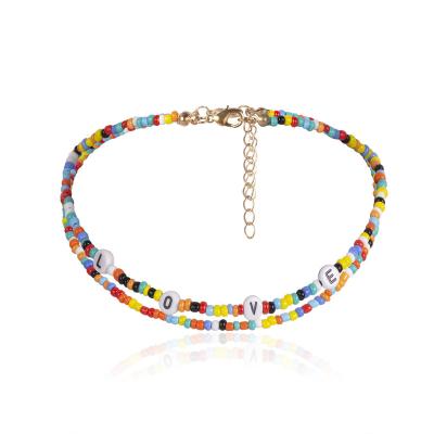 China FASHIONABLE colorful rice beads knitted multilayer personality LOVE letter necklace dinner beach vacation knitted soft necklace for sale