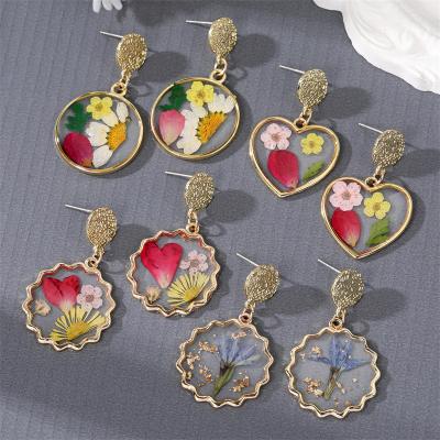 China Ace IMAGE Round Drip Glue Colored Simple Eternal Blossom Flower Earrings Women's Dry Earrings for sale