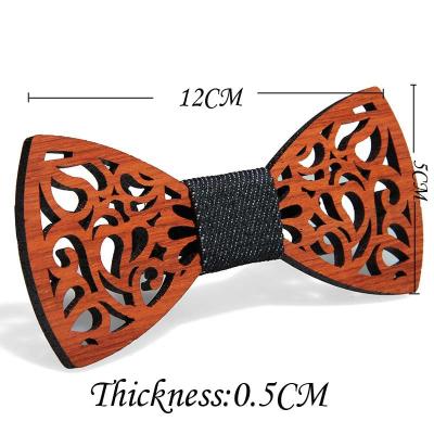 China Classic Vintage Hand Contracted Hollow Bow High Quality Red Pear Solid Wood Carved Bow Tie For Men for sale