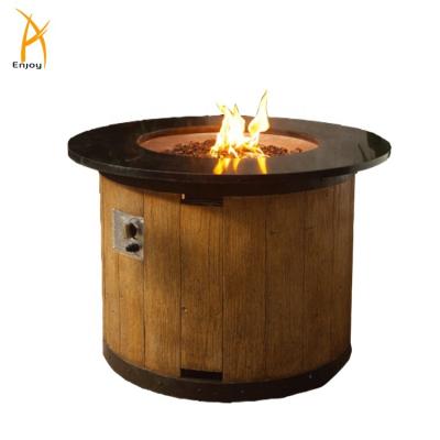 China Stored Round Faux Wood Fire Pit Marble Fire Table Gas Fire Pit for sale