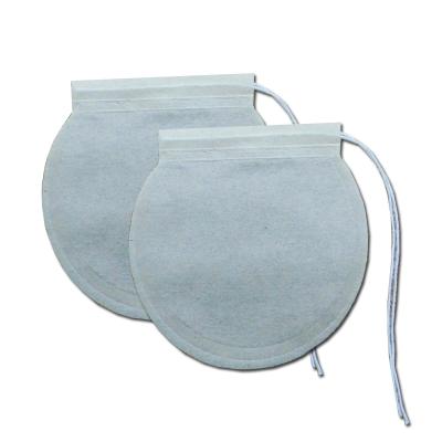 China Heat Seal 75mm Disposable Round 3-10g Paper Tea Bag Filter Empty Paper Tea Bag With String for sale