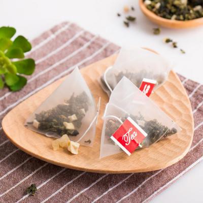 China Disposable Custom Flower Nylon Empty Tea Bag Drawstring Triangle Mesh Food Grade Pyramid Filter Bag for sale