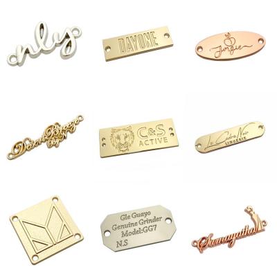 China Two Holes Fashion Labels Metal Viable Gold Customized Small Sewing Tags For Clothes for sale