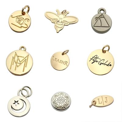 China Nickel Free/Lead Free/Top Quality Small Brand Logo Engraved Custom Metal Charm Jewelry Pendant Tags for sale