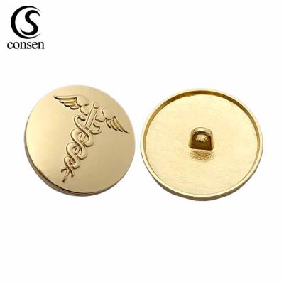 China Washable antioxidant color custom embossed logo made gold metal leg button for sewing for sale