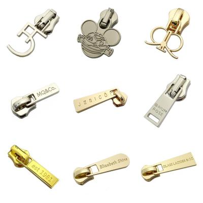 China Nickel free stylish puller with personalized letter logo metal zipper pulls for handbag for sale