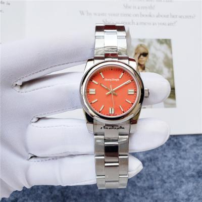 China Luxury Silver Clear Case Dial Fashion Reserve 957 Orange Power Logo 316L 31MM Stainless Steel Mechanical Lady Watch for sale