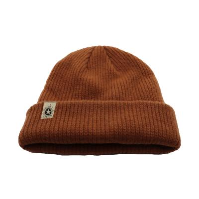 China COMMON Cozy Winter Knitted Skull Cap Beanie Caps Custom Your Logo High Quality Solid Color Fashion Watch Beanie Hat for sale