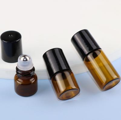 China Package 1ml 2ml 3ml Rollerball Amber Glass Bottle With Metal Rollerball Brown Essential Oil Rollerball Transparent Glass Bottle for sale