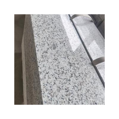 China Modern, custom made natural white granite is inexpensive and suitable for exterior and interior dry hanging stairs and floor tile countertops for sale