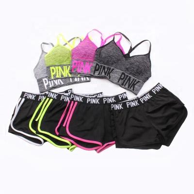 China Fake Two Pieces Breathable Fitness Pants Stripes Running Tops Sportswear Yoga Short Pants Sports Bra Suit Sportswear Shorts Set For Women for sale