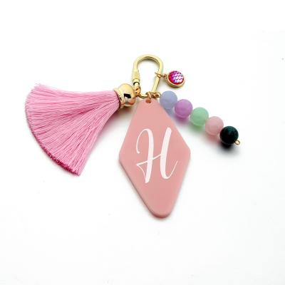 China Creative Tassel Letter Shape Pendant Accessories New Pearl Geometric Rhombus A-Z Acrylic Keychains Bag Pendant Accessories Letter-Initial Key Chain for sale