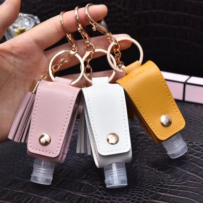 China Home Organization 30ml Bottle Holder Hand Sanitizer Bottle Cover PU Leather Tassel Holder Chain Key Chain Cover 30ML Bottle Holder for sale