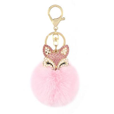 China New Fashion Faux Rabbit Fur Pom Pom Keychain Fashion Fox Head Pom Pom Pendant Pink Ball Fox Head Shape Accessories Key Chain for sale