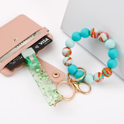 China Fashional Souvenir Gifts Amazon Hot-selling Silicone Bead Bracelet Credit Card Holder Key Chain Silicone Beads Bracelet Key Ring for sale