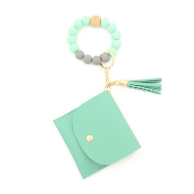 China Fashional Keepsake Gifts Leather Beaded Credit Cards Wooden Beaded Wallet Women Silicone ID Key Chain Key Chain for sale