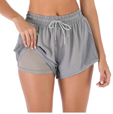 China 2021 Anti-wrinkle custom women plus size 2 in 1 double-layer fitness running shorts ladies fitness running shorts with zipper pockets for sale