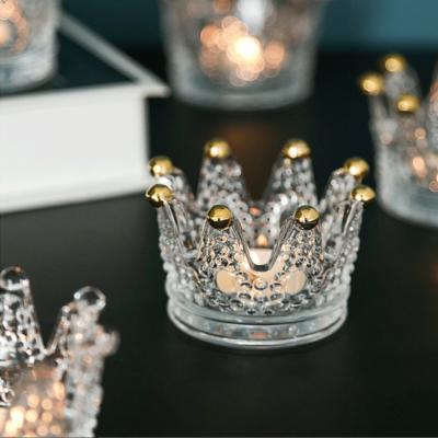 China Modern Luxury Elegant Swollen Jewelry Crown Decoration Glass Candle Holder Home Decor Hand Candle Holder for sale