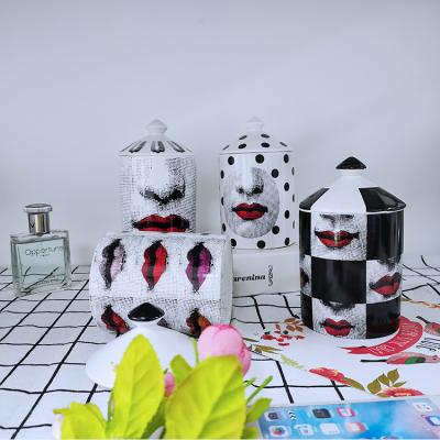 China Wholesale Home Decoration Abstract Face Design Ceramic Candle Jar With Lid Porcelain Candle Canister For Home Decoration for sale