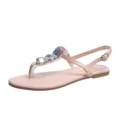 China Buckle Toe Station Beach Fashion Trend New Women's Sandals Large Size Rhinestone One Line Roman Style Independent Sandals for sale