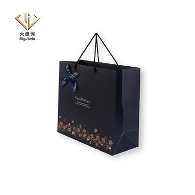 China Recycled Paper Shopping Bag With Flat Handle High Fashion Gift Packaging Recycled Navy Blue Paper Bag Custom Logo Design Printed Bag for sale