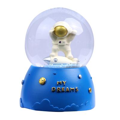 China 2023 Folk Art Alien Astronaut Crystal Ball Resin Ornaments With Lights Drift Snow Hotel Decor Christmas Home Souvenirs For Kids for sale