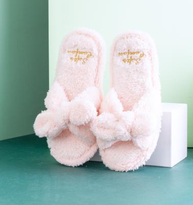 China Anti-Static Plush Slippers With Bowknot For Women Girls Winter Slippers Indoor Warm Home Slippers for sale