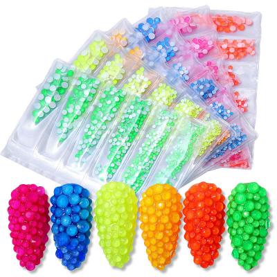 China Luminous Gel UV Nail Polish Decorations Luminous Crystal SS4-SS16 Mixed Size Nail Art Rhinestone Decorations Flat Fluorescence Glass DIY Nails Accessories for sale