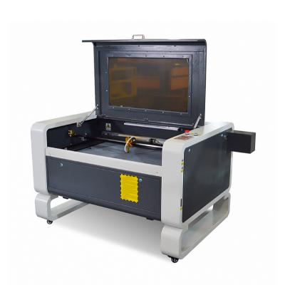 China Water cooled Fonland 6090 industry 80w laser equipment laser cutting machines for accessories acrylic parts with laser cutting machine for sale