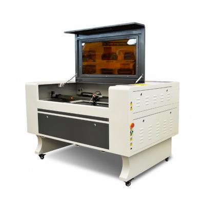 China Hot Sale 6090 CO2 130w Water Cooled Laser Engraving and Acrylic Cutting Machine 6445 Patch Laser Leather Engraving and Cutting Machine for sale