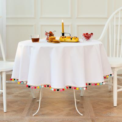 China Pure White Cotton Round Waterproof Hot Selling Linen Dining Tablecloth With Pompom for sale