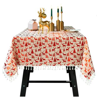 China Waterproof Christmas Printed Glitter Deer And Tree Decoration Rectangle Table Cloth With Tassel for sale