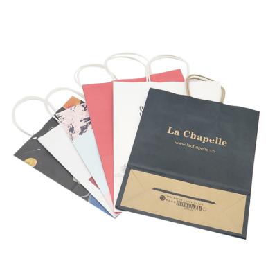 China Biodegradable Custom Shopping Paper Bag With Logo Paper Shopping Bag With Handle Luxury Shopping Paper Bag for sale