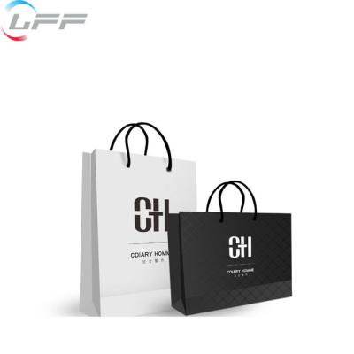 China Recyclable Custom Clothing Food Retail Perfume Kraft Paper Black Shopping Bag With Logo Print for sale