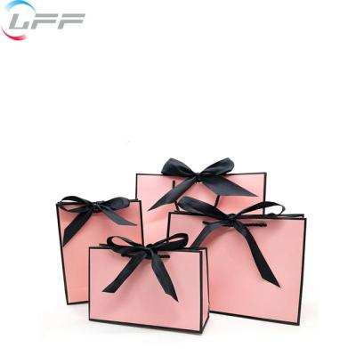 China Perfume Recyclable Cosmetics Paper Bag With Logo Offset Printing Cardboard Flexiloop Recyclable Handle LFF Hot Selling Fashion Customized for sale