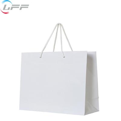 China Recyclable Custom Labeled Black Luxury Boutique Shopping Paper Bag With Logo for sale