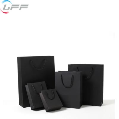 China Recyclable Wholesale Custom Paper Gift Shopping Bag With Logo Print for sale