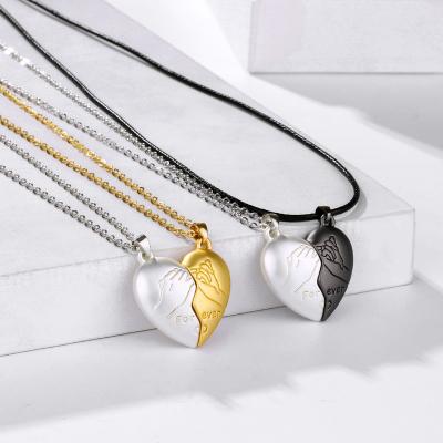 China Customized Valentine's Day Romantic Gold Silver Heart Pendant Necklace His Her Creative Oath Magnet Couples Charm Necklace Chain for sale