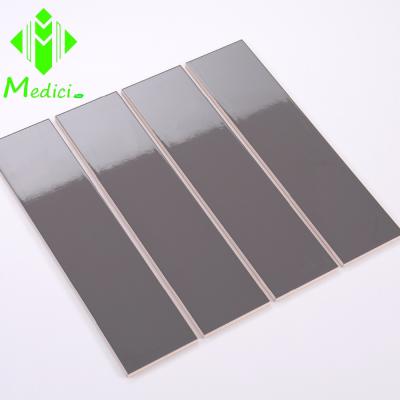 China Rustic Dark Gray Flat Tiles 3x12 75x300mm Foshan Factory Subway Interior Front Wall Tile for sale