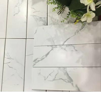 China Glazed metallic tiles 100*300mm calacatta carara shiny marble glazed finished wall tile subway tiles for sale