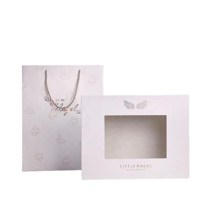 China high quality luxury gold stamping with clear window handmade box for children clothes for sale